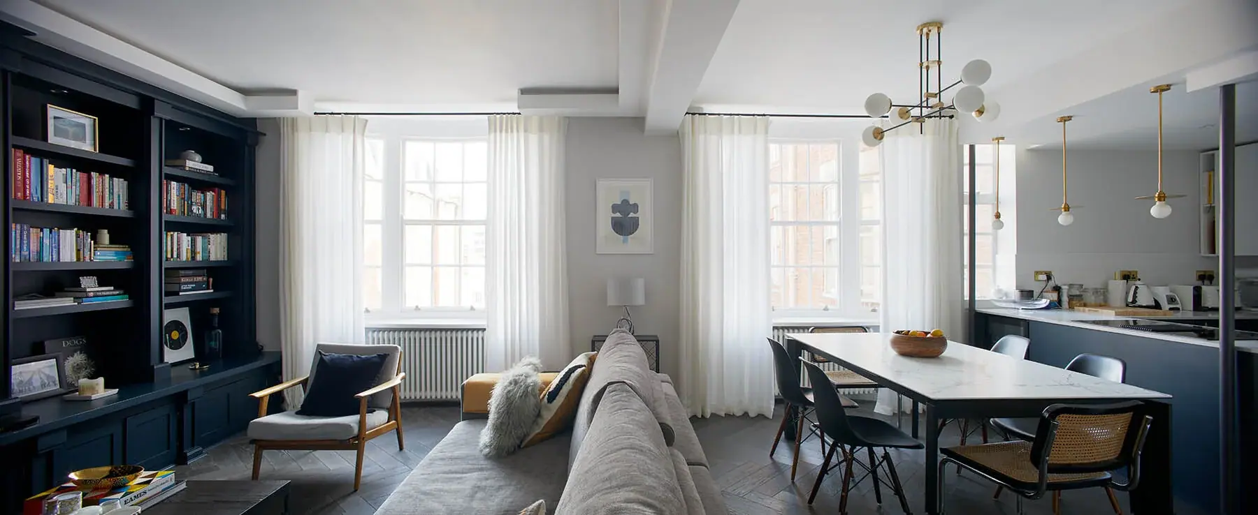 Bayswater apartment living room with bespoke navy joinery by Studio Schubert