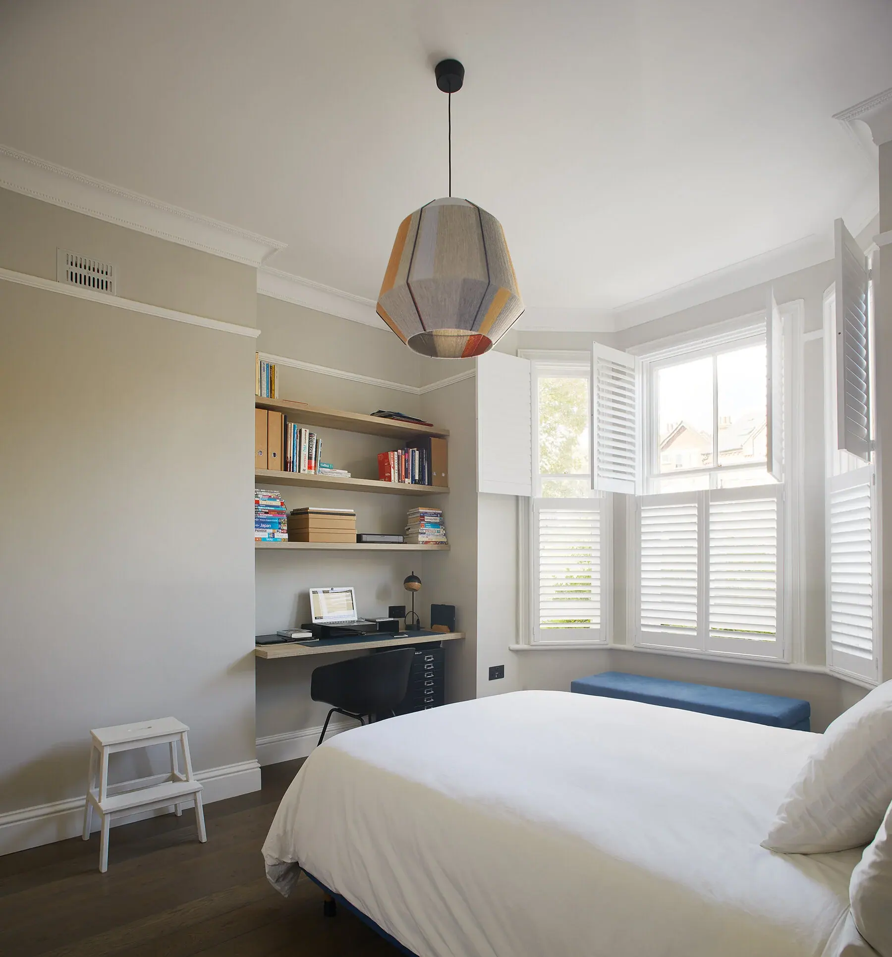 The bedroom earned a walk-in-wardrobe with practical storage and an office area where the client can work when in London.